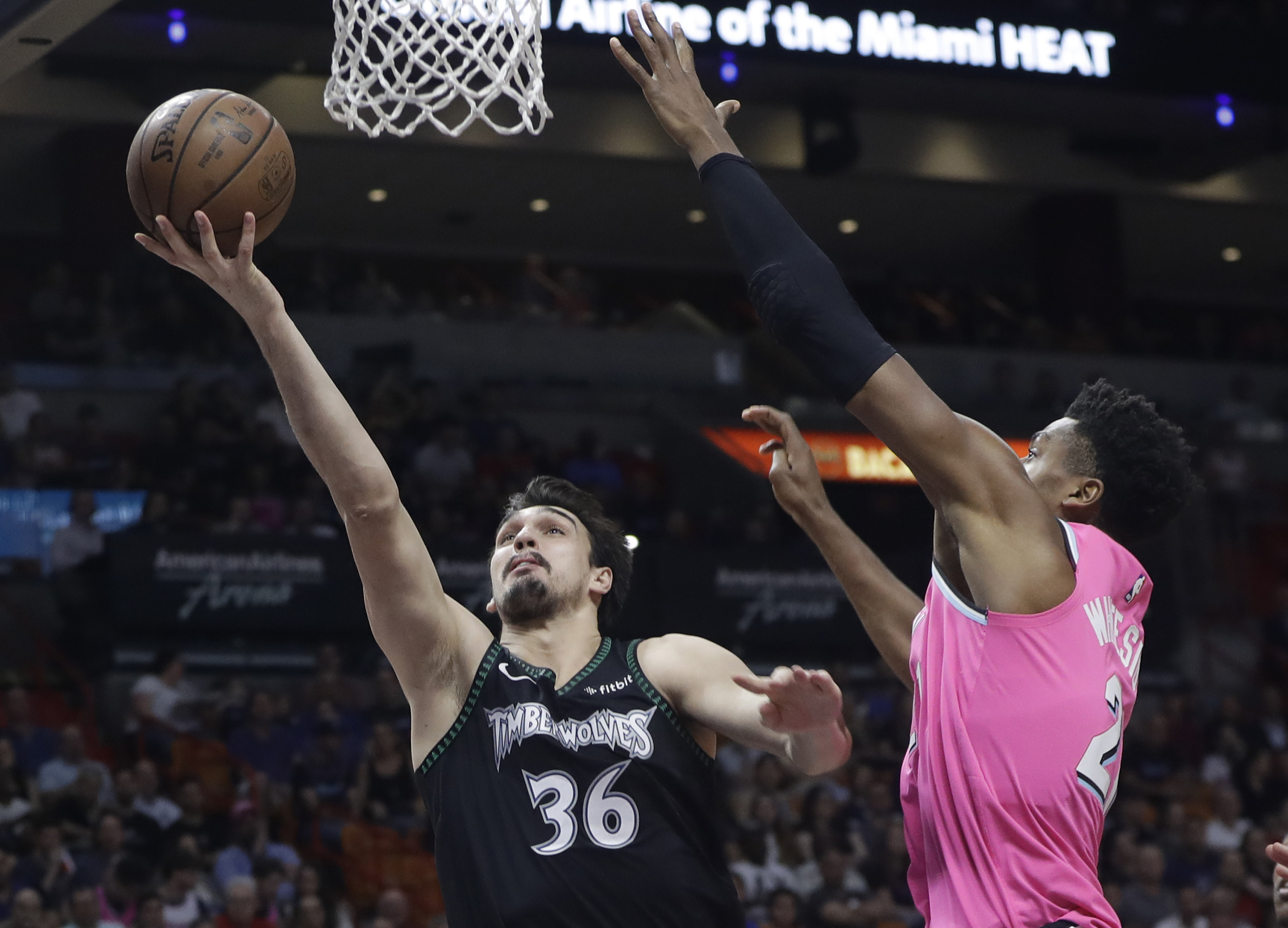 Towns scores 34 points, leads Timberwolves past Heat 113-104
