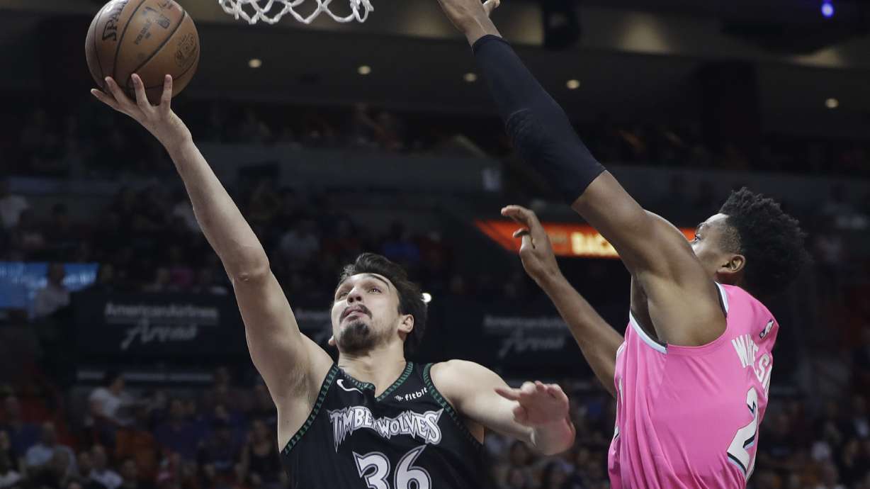 Towns scores 34 points, leads Timberwolves past Heat 113-104