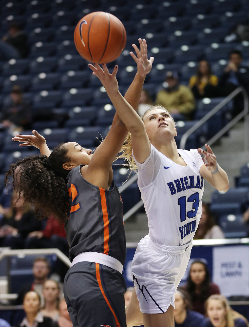 Brigham Young Cougars guard Paisley Johnson (13) drives by Pepperdine Waves guard Rose Pflug (2)in Provo on Thursday, Jan. 3, 2019. (Photo: Jeffrey D. Allred, Deseret News)