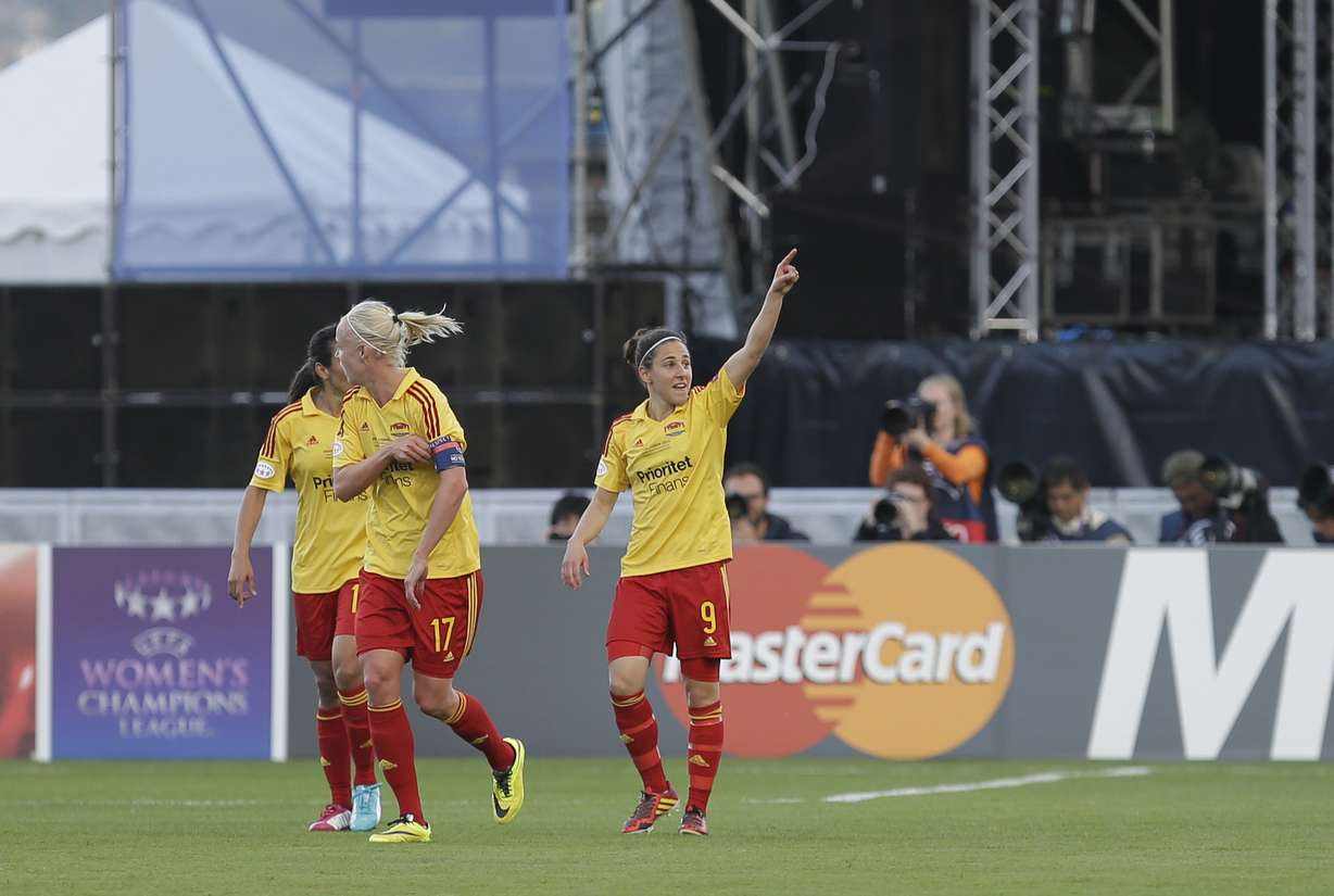 Tyreso' s Veronica Boquete, right, from Spain, celebrates after scoring her team's second goal against Wolfsburg during the Women's Champions League final soccer match between Wolfsburg and Tyreso at the Restelo stadium in Lisbon, Thursday, May 22, 2014. (Photo: Francisco Seco, AP)