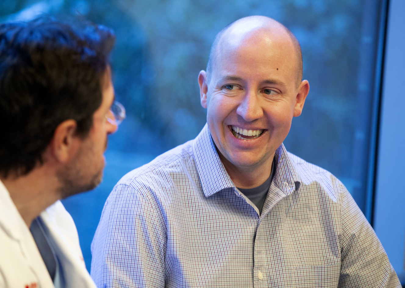 Heart transplant recipient Ben Burrup, right, speaks with Dr. Craig Selzman, chief of the Division of Cardiothoracic Surgery at the University of Utah, during a press conference at the University of Utah Hospital in Salt Lake City on Friday, Jan. 4, 2019. Burrup received a new heart in February 2018. University of Utah Health announced Friday it performed a record-breaking number of organ transplants in 2018. (Photo: Laura Seitz, KSL)