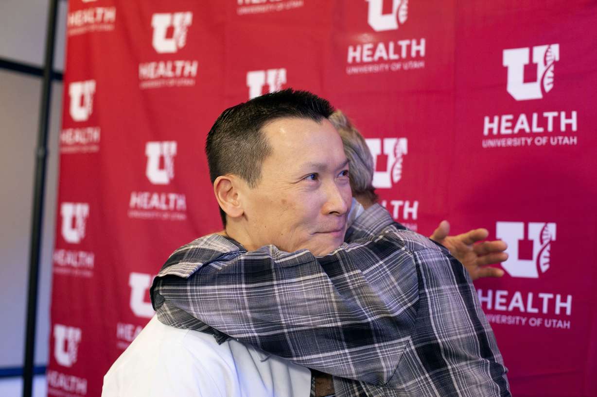 Dr. Robin Kim, chief of the Division of Transplantation and Advanced Hepatobiliary Surgery at the University of Utah, gets a hug from liver transplant recipient James Dillard at the University of Utah Hospital in Salt Lake City on Friday, Jan. 4, 2019. Dillard received a new liver in in December 2018. University of Utah Health announced Friday it performed a record-breaking number of organ transplants in 2018. (Photo: Laura Seitz, KSL)