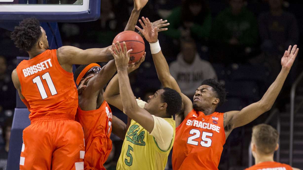 Hughes' career day sparks Syracuse past Notre Dame 72-62