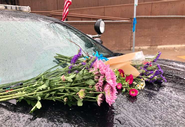 Flowers are left on the police vehicle belonging to fallen Provo police officer Joseph Shinners on Sunday, Jan. 6, 2019. (Photo: Sean Moody, KSL TV)