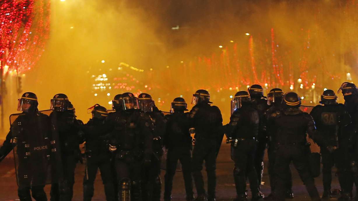 Former pro boxer in custody after assault on French police