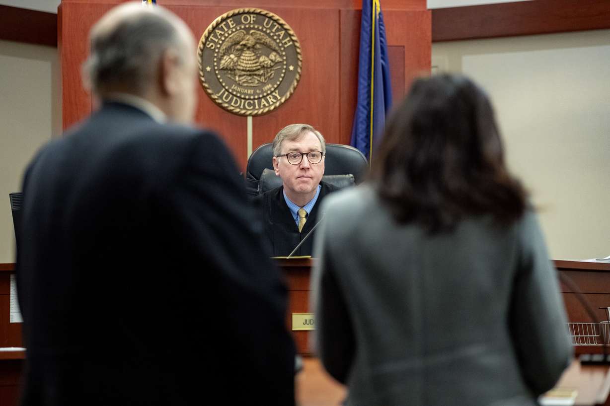 Third District Judge Keith Kelly talks to Brent E. Taylor, former director of the Utah Valley Youth Symphony, and his attorney, Cara Tangaro, during a hearing at the Matheson Courthouse in Salt Lake City on Monday, Jan. 7, 2019. Taylor, who is accused of sexually abusing three boys about 30 years ago, was ordered Monday to wear an ankle monitor. Photo: Scott G Winterton, KSL