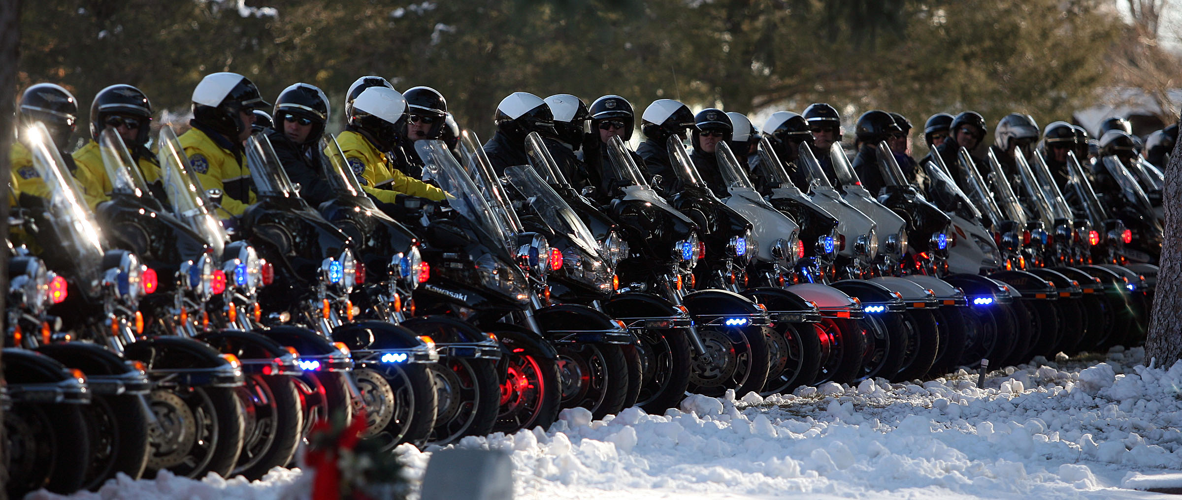 The motorcade lines up at the Ogden Cemetery for the graveside service of Ogden officer Jared Francom in Ogden Wednesday, January 11, 2012. (Photo: Brian Nicholson, Deseret News, File)