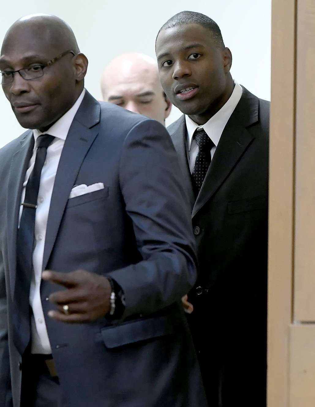 Torrey Green, right, enters the courtroom with his private investigator, E. Christian Warmsley, for his rape trial in 1st District Court in Brigham City on Monday, Jan. 7, 2019. Green is accused of raping multiple women while he was a football player at Utah State University. (Photo: Eli Lucero, Pool)