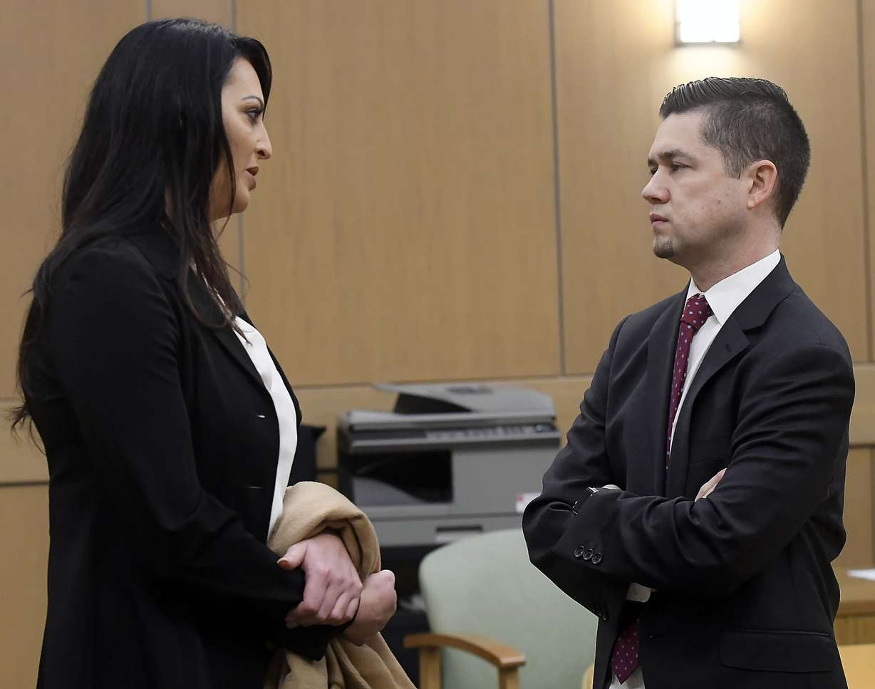Defense attorney Skye Lazaro, left, talks to prosecuting attorney Spencer Walsh before the start of Torrey Green's rape trial in 1st District Court in Brigham City on Monday, Jan. 7, 2019. Green is accused of raping multiple women while he was a football player at Utah State University. (Photo: Eli Lucero, Pool)