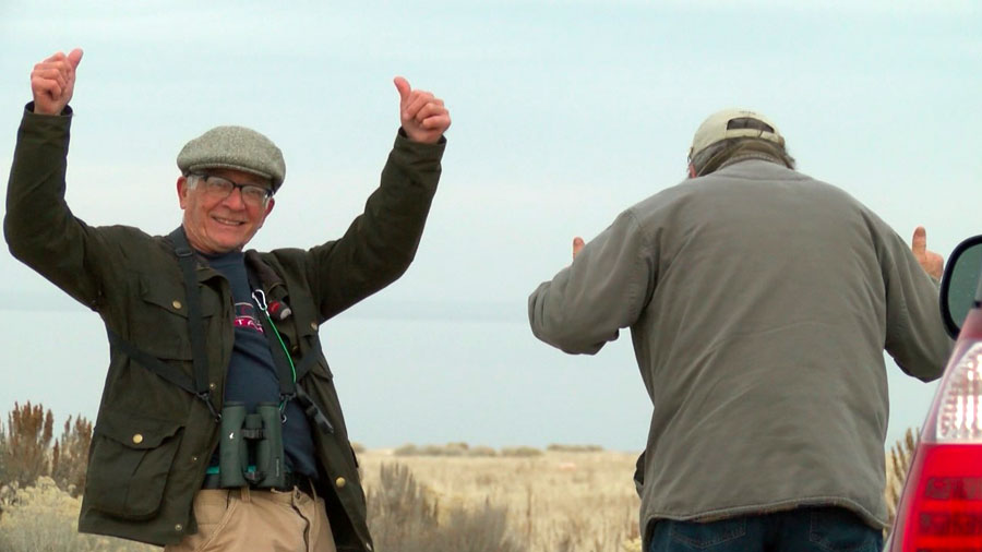Birders Paul Lombardi and Dan Johnston celebrate after finding a burrowing owl on Antelope Island. (Photo: KSL TV)