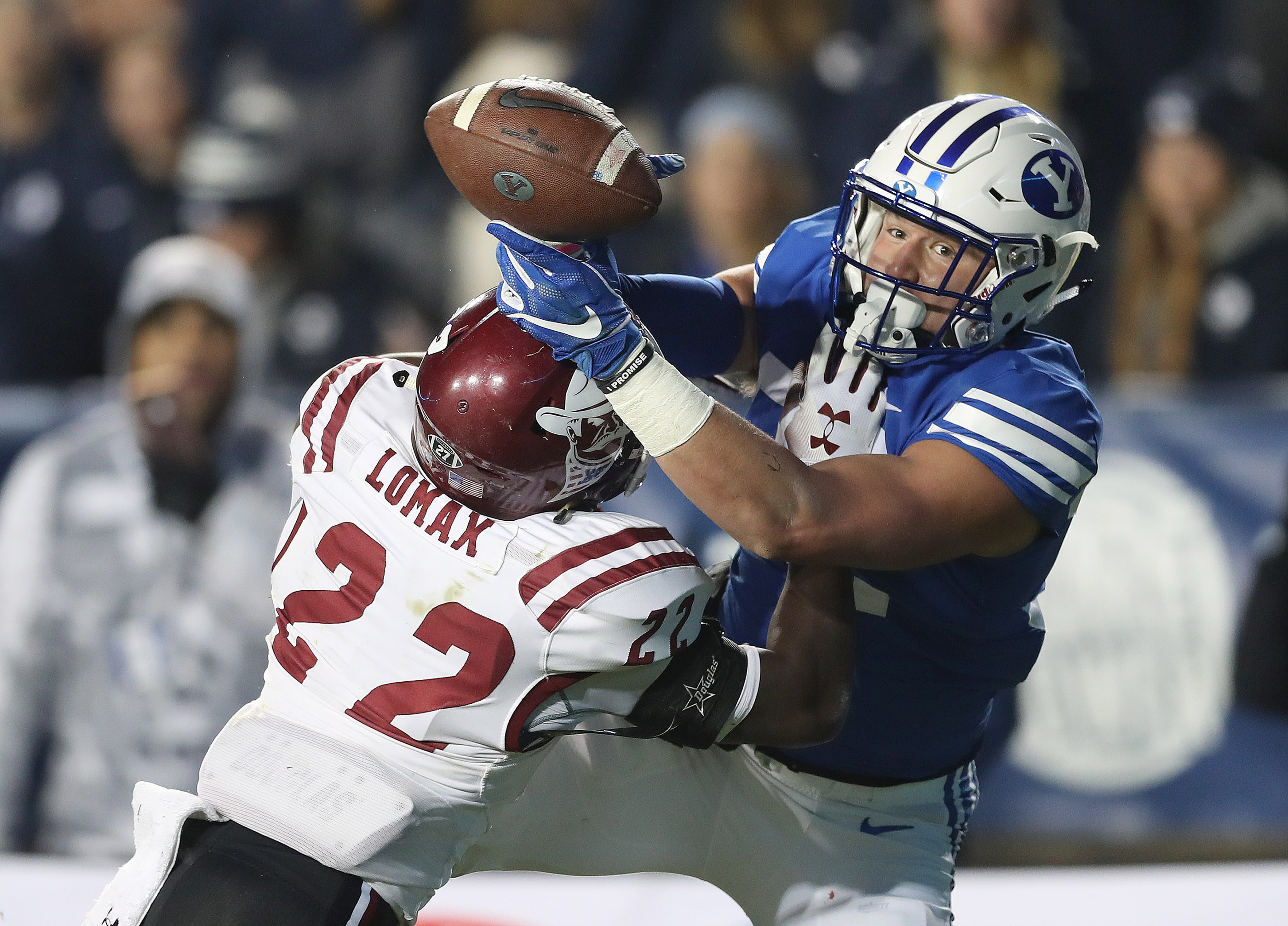 BYU tight end Dallin Holker (32) tries to catch the pass under pressure from New Mexico State defensive back Shamad Lomax (22) in Provo on Saturday, Nov. 17, 2018. (Photo: Jeffrey D. Allred, KSL)