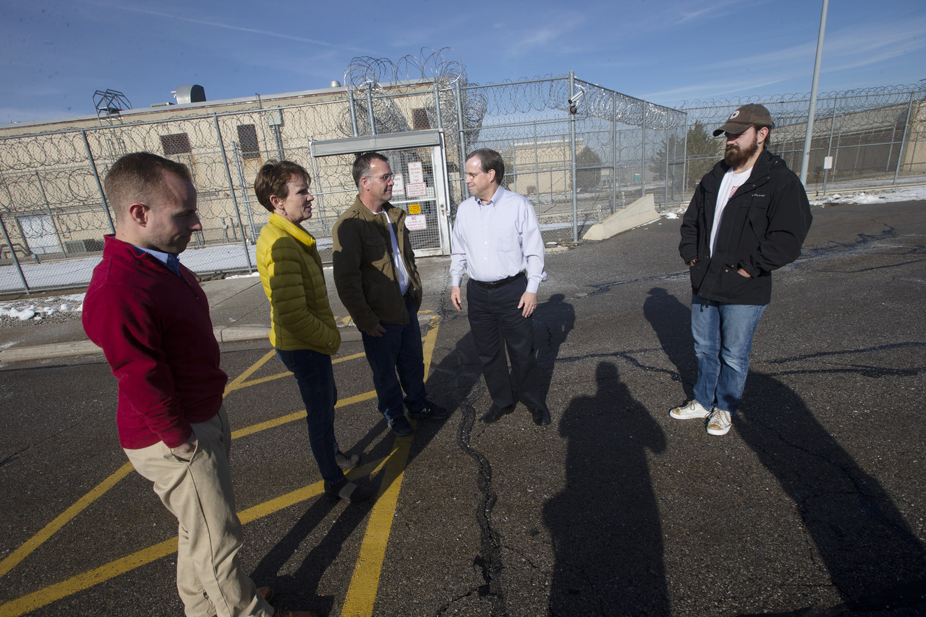 Victims Andrew Martin, left, and Benjamin Bladh, right, talk with their parents, Amy and Dan Bladh, and Todd Martin, second from right, after they attended Robert Allen Kartchner's parole hearing at the Utah State Prison in Draper on Tuesday, Jan. 8, 2019. (Photo: Scott G Winterton, KSL)