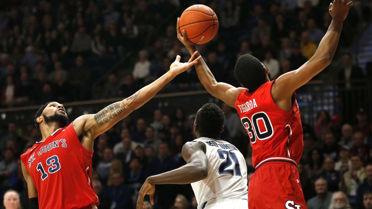 Booth rallies champion Wildcats past No. 24 St. John's