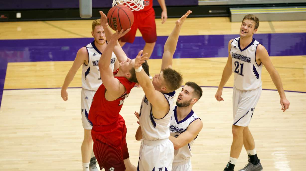 Dixie State junior forward Matt Conway (#22) lays in two of his team-high 22 points in the Trailblazers' 68-64 loss at Westminster College Saturday night in Behnken Field House.