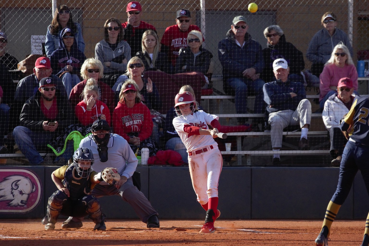 Dixie State infielder Dani Bartholf lines a double to left center against California Baptist. (Photo: Stan Plewe, Dixie State Athletics)