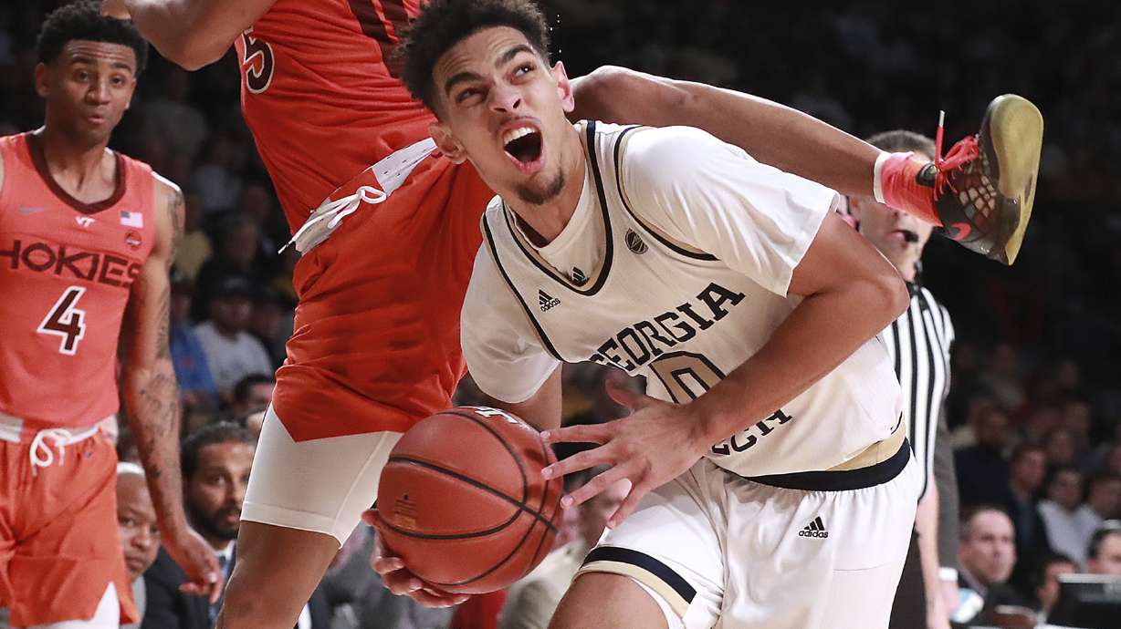 No. 9 Virginia Tech holds off Georgia Tech 52-49