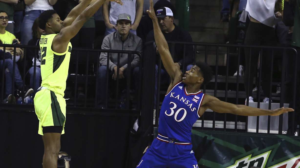 Vick 6 3s on birthday for No. 7 Kansas to beat Baylor 73-68
