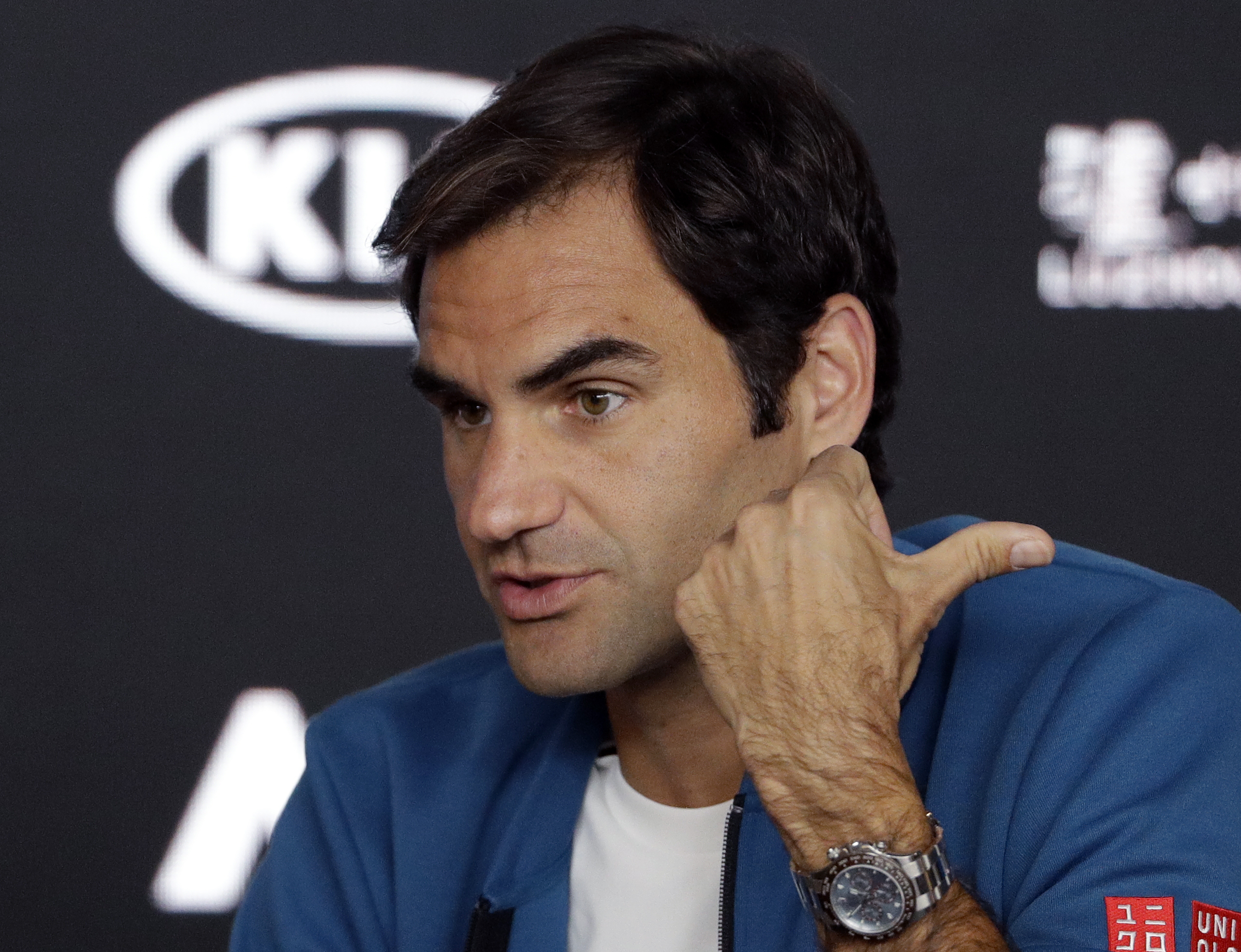 Champions Wozniacki, Federer on different ends of spectrum