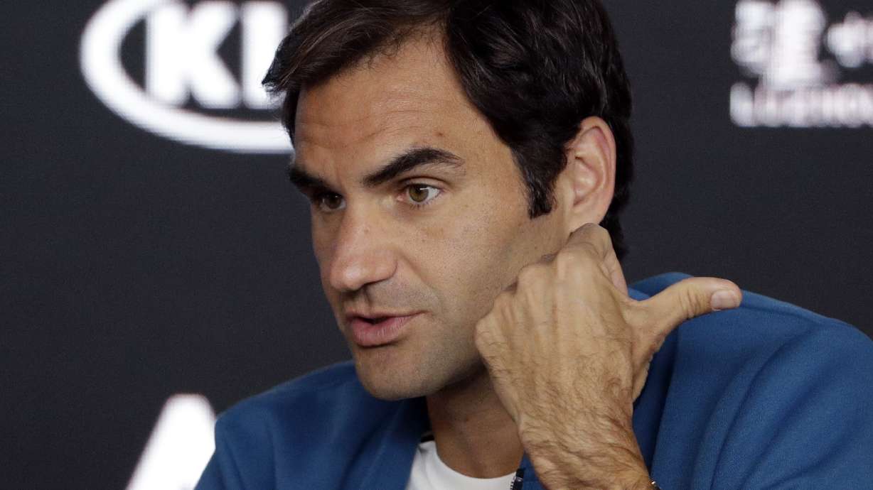 Champions Wozniacki, Federer on different ends of spectrum