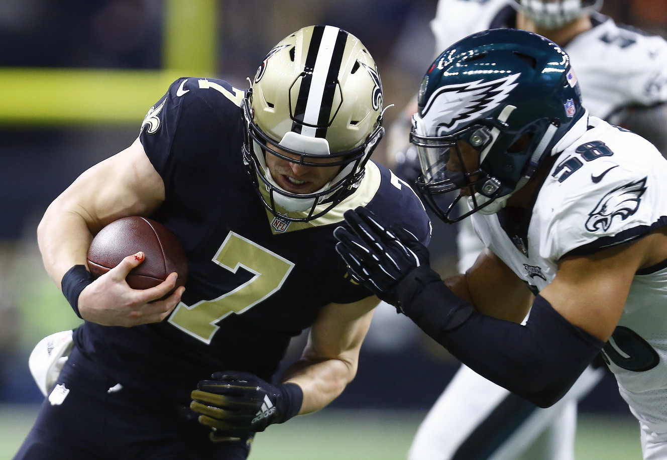 Philadelphia Eagles middle linebacker Jordan Hicks (58) hits New Orleans Saints quarterback Taysom Hill (7) in the first half of an NFL divisional playoff football game in New Orleans, Sunday, Jan. 13, 2019. (Photo: Butch Dill, AP)