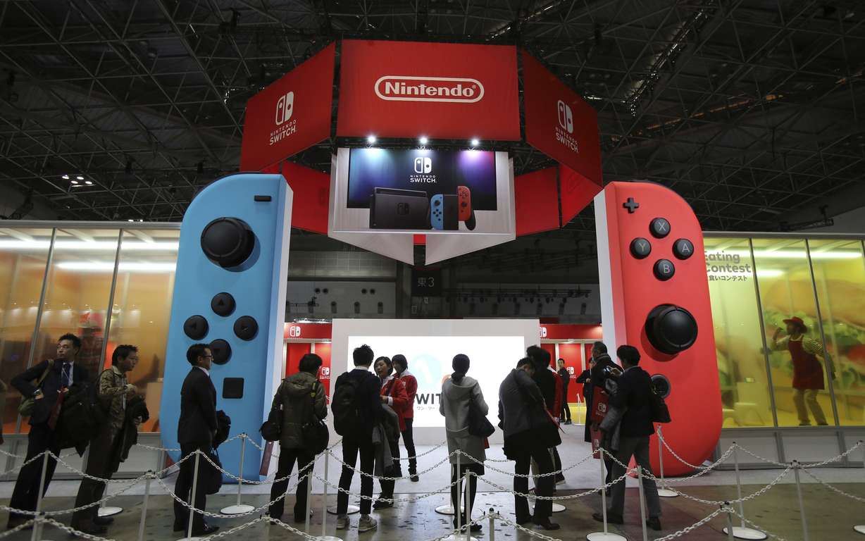 File photo of the line-up to catch a first glimpse of the Nintendo Switch in Tokyo on Jan. 13, 2017. (Photo: Koji Sasahara, AP File Photo)