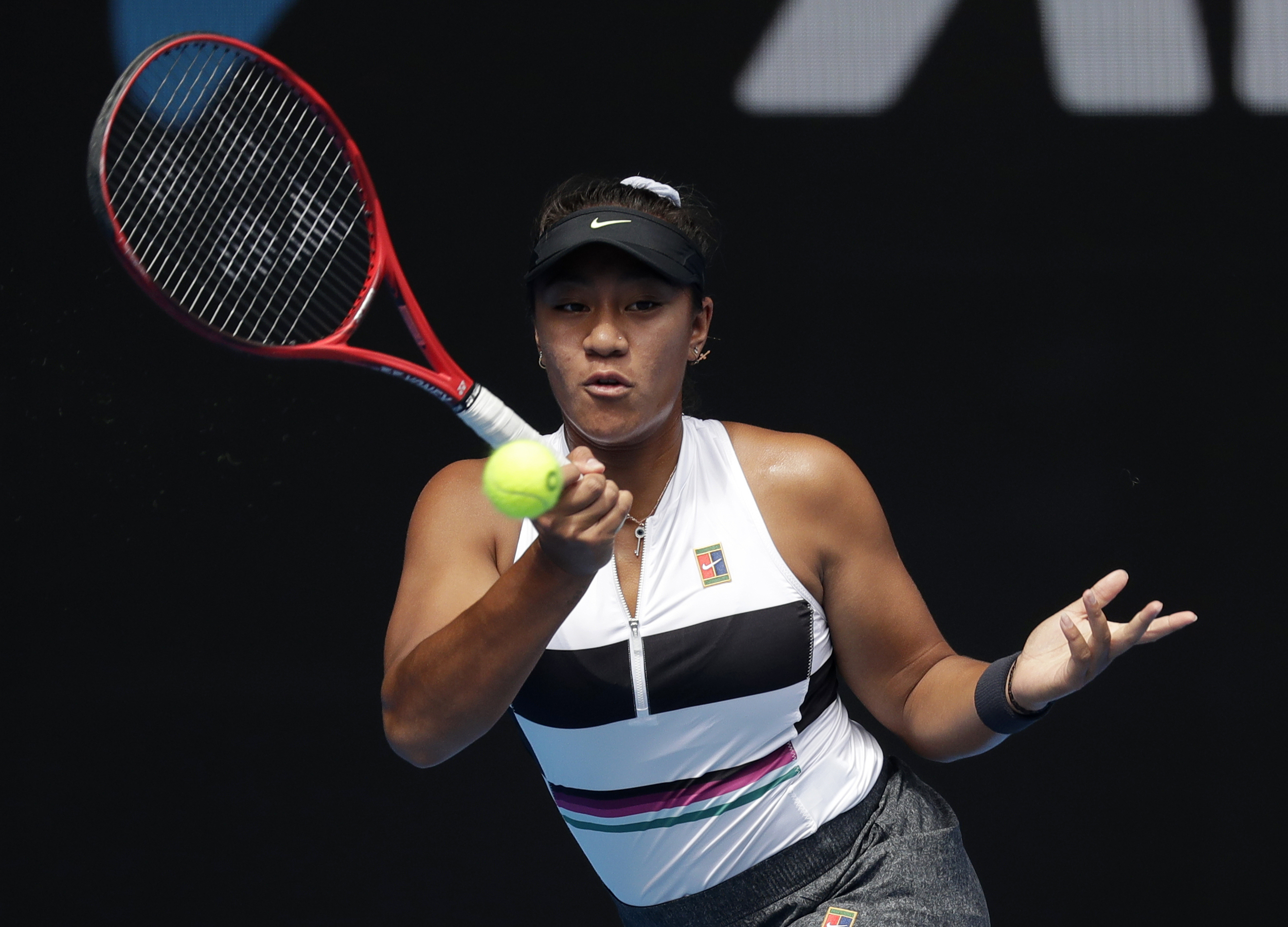 The Latest: Thiem fends off Paire in 5 at Australian Open