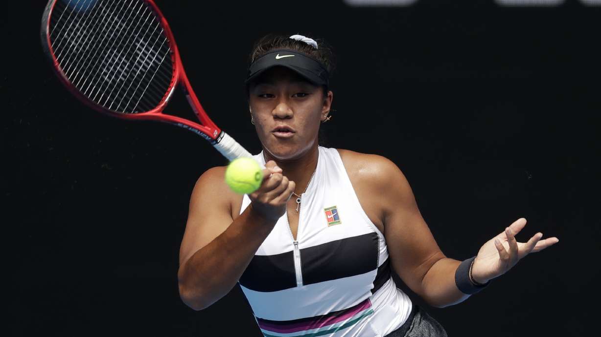 The Latest: Thiem fends off Paire in 5 at Australian Open
