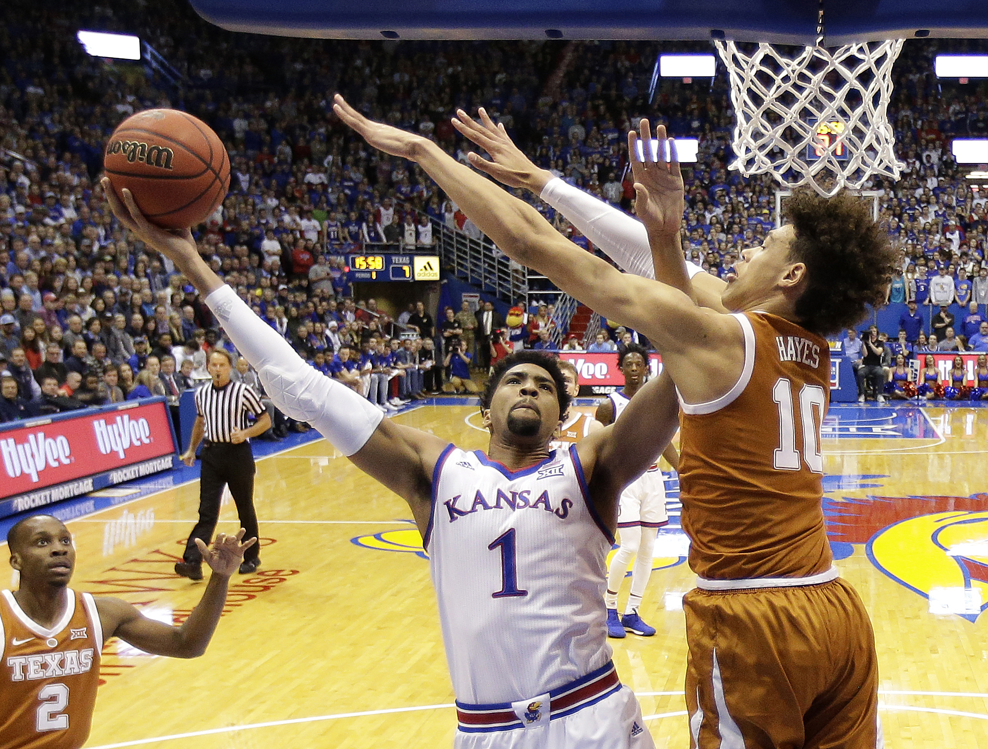No. 7 Kansas holds on to beat Texas 80-78 at Phog