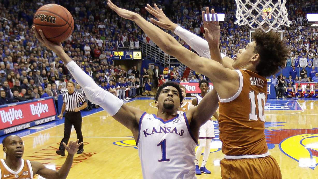 No. 7 Kansas holds on to beat Texas 80-78 at Phog