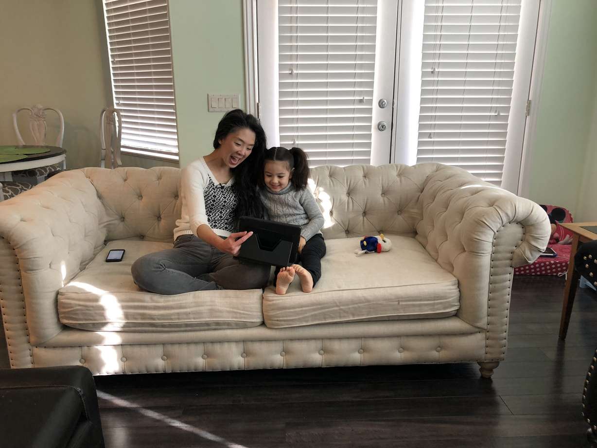V. Thipsouvan and her daughter, Raven, Skype Zariah and her father Shawn Donovan in Ohio. The family has had to live apart for three years and seven months because of major complications from Zariah's premature birth. (Photo: KSL TV)