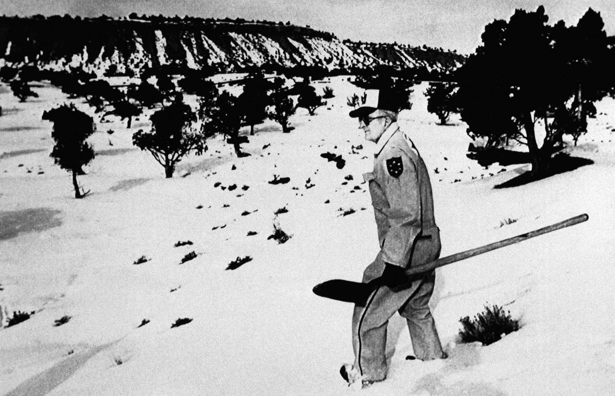 Jim Simone of the Carbon County Search and Rescue team sets out near Price, Utah, Jan. 28, 1989, in search of the remains of 15-year-old Sue Curtis, whose grave Ted Bundy described less than an hour before he was executed Tuesday. Ms. Curtis disappeared from Brigham Young University in 1975 and was believed to be one of at least 23 murders Bundy confessed to in Utah, Idaho, Washington and Colorado. (George Frey, AP Photo, File)
