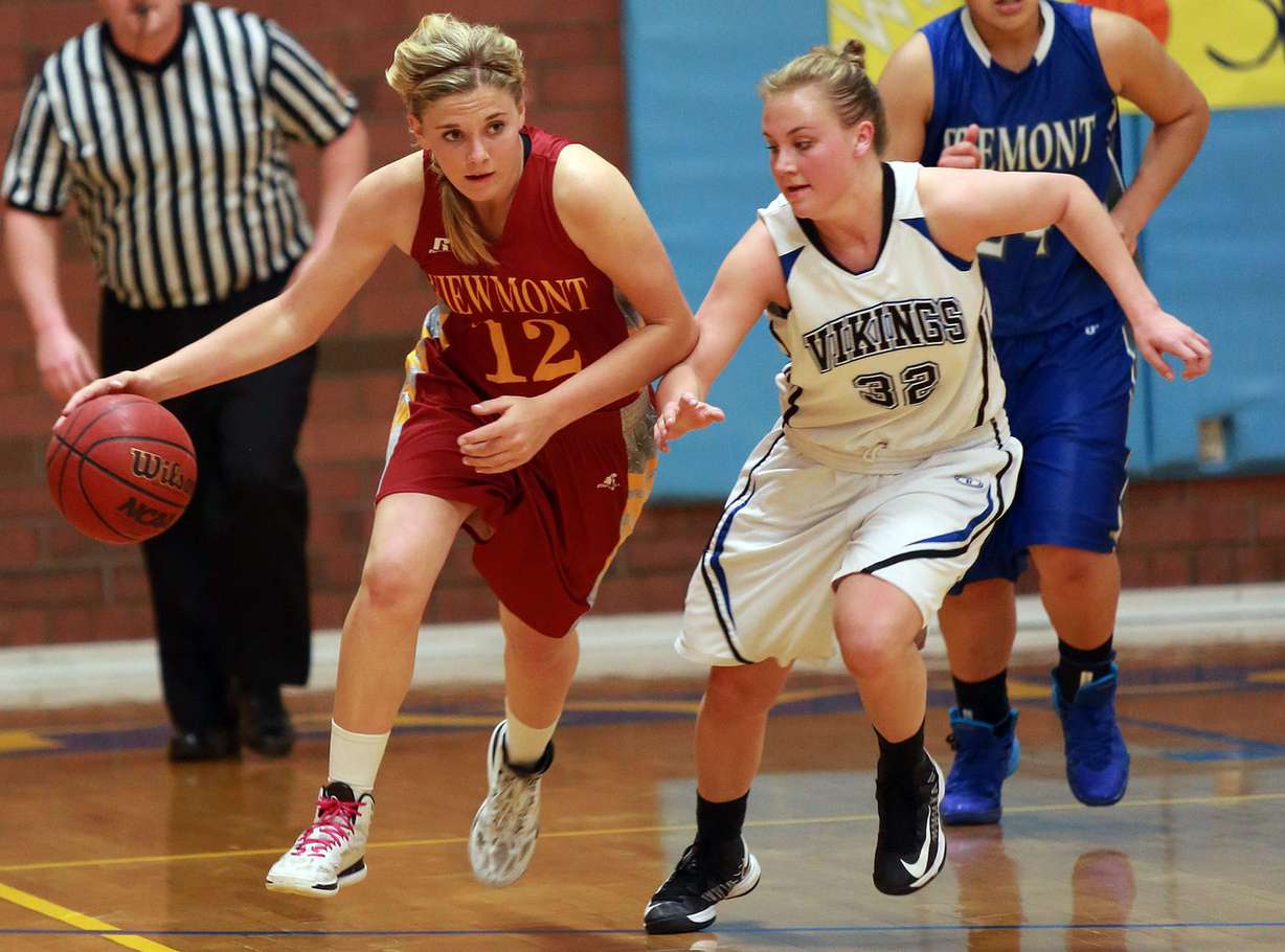 Viewmon's Caitlyn Larsen dribbles next to Pleasant Grove's MeKenna Miles in the 5A Girls Allstar basketball game at Taylorsville High School in Taylorsville on Saturday, March 22, 2014. (Photo: Kristin Murphy, Deseret News)