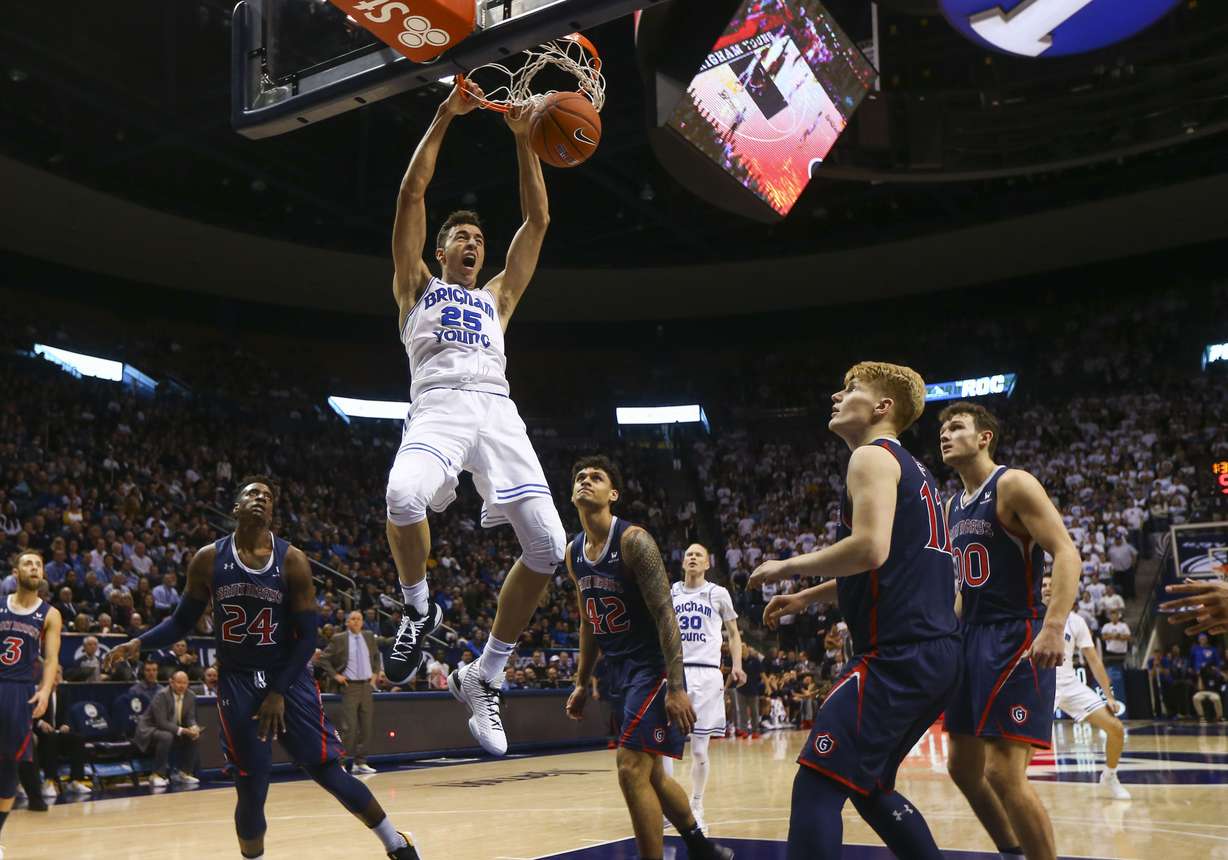 BYU forward Gavin Baxter (25) dunks the ball against St. Mary's Gaels at the Marriott Center in Provo on Thursday, Jan. 24, 2019. (Photo: Silas Walker, Deseret News)