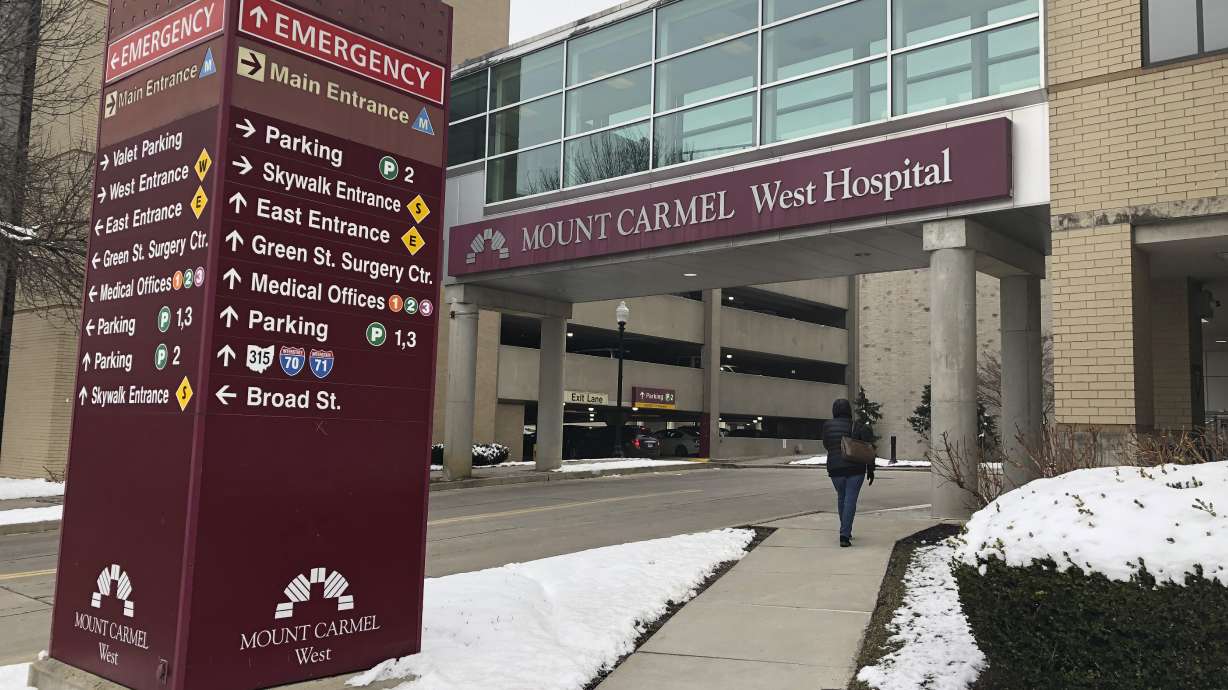The Latest: Doctor's license suspended after hospital deaths