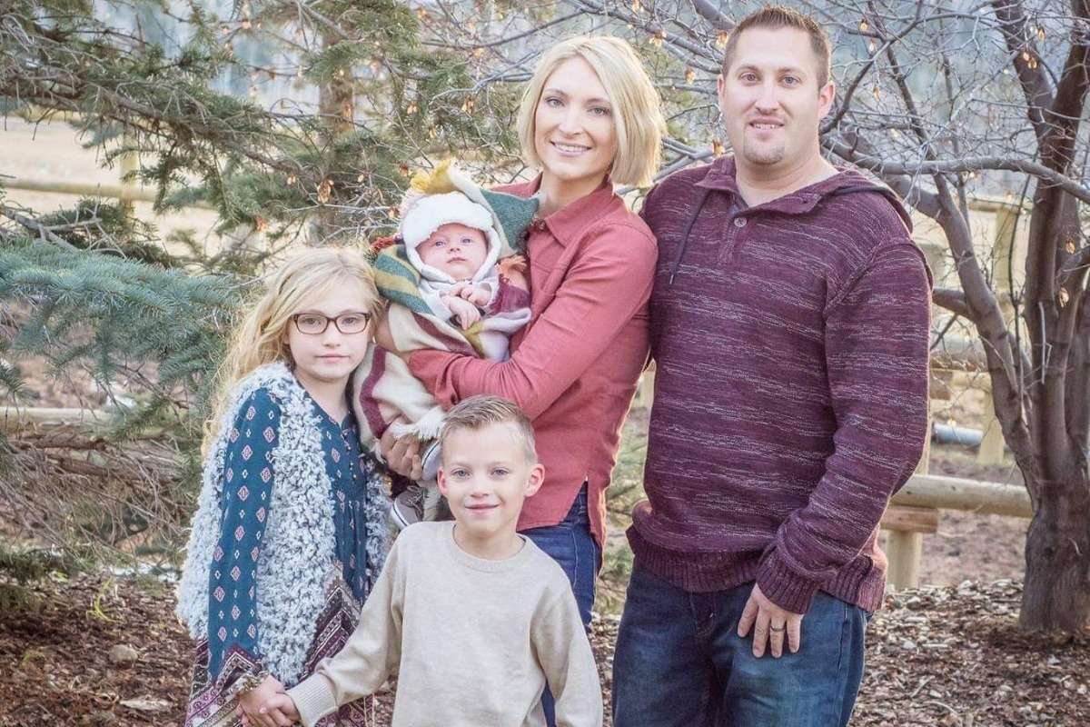 Tommy Hawkins, 35, of Layton, pictured with his family, was caught in an avalanche and killed while snowmobiling in Bonneville County, Idaho, on Friday, Jan. 25, 2019. (Photo: GoFundMe)