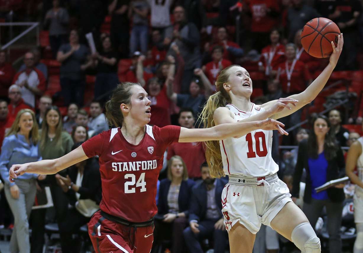 Utah guard Dru Gylten (10) lays up the ball as Stanford forward Lacie Hull (24) defends during the second half of an NCAA college basketball game Sunday, Jan. 27, 2019, in Salt Lake City. (Photo: Rick Bowmer, AP)