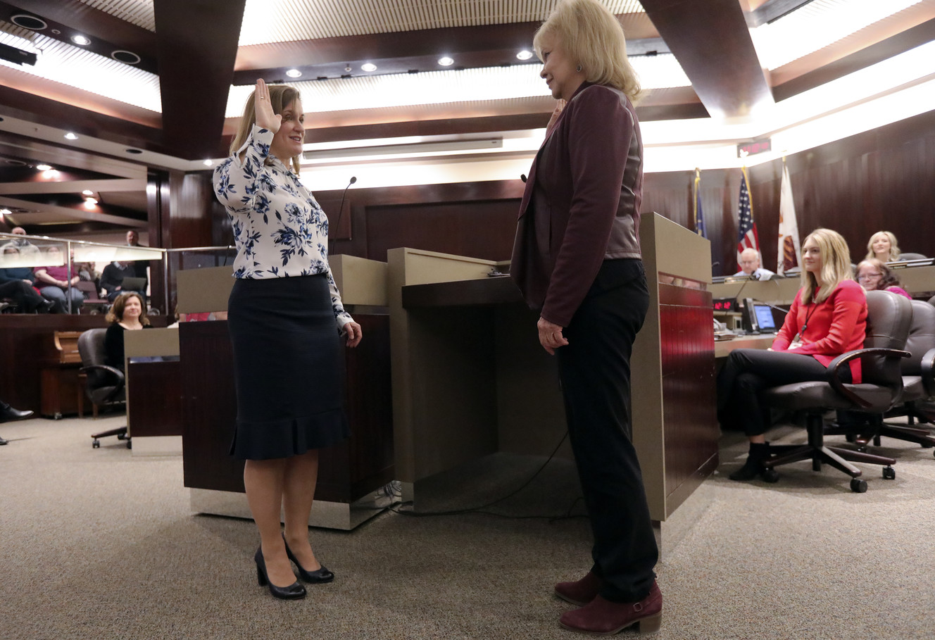 Jenny Wilson takes the mayoral oath of office from Salt Lake County Clerk Sherrie Swensen at the Salt Lake County Government Center in Salt Lake City on Tuesday, Jan. 29, 2019. (Photo: Kristin Murphy, KSL)