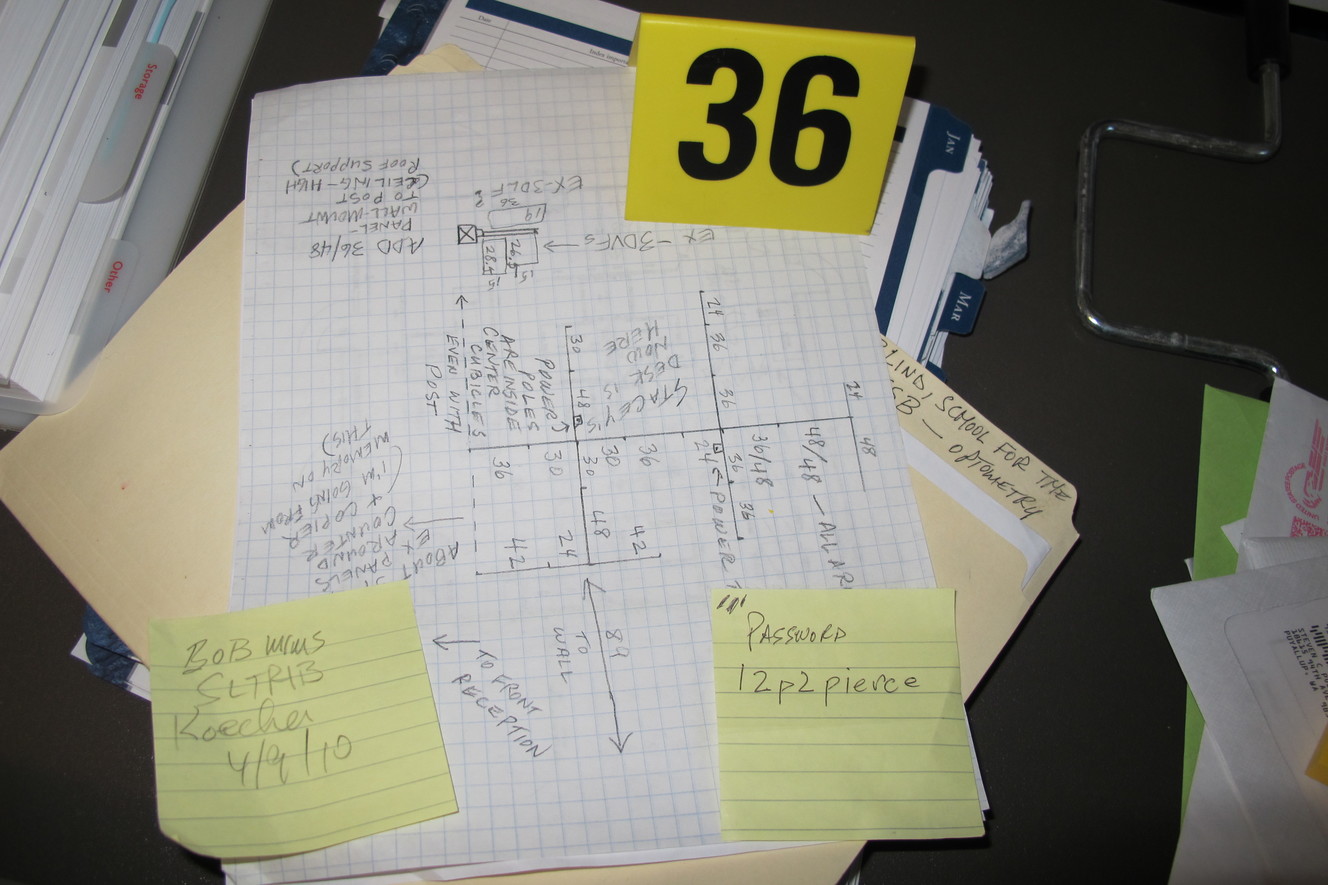 While serving a search warrant at the South Hill, Wash., home of Steve Powell on Aug. 25, 2011, police looked for any writings that appeared to hold possible passwords. Those potential passwords were entered into Josh Powell's encrypted digital media, in the hopes of getting past encryption. (Photo: West Valley Police Department)
