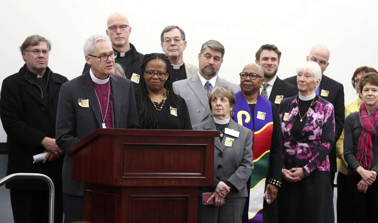 The Rev. Jim Gonia, bishop of the Rocky Mountain Synod Evangelical Lutheran Church in America, is joined by faith and community leaders during a press conference at the State Office Building in Salt Lake City on Thursday, Jan. 31, 2019, where faith and community leaders discussed the importance of Medicaid expansion. (Photo: Steve Griffin, Deseret News)