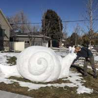 Utah man builds large snow sculptures around neighborhood