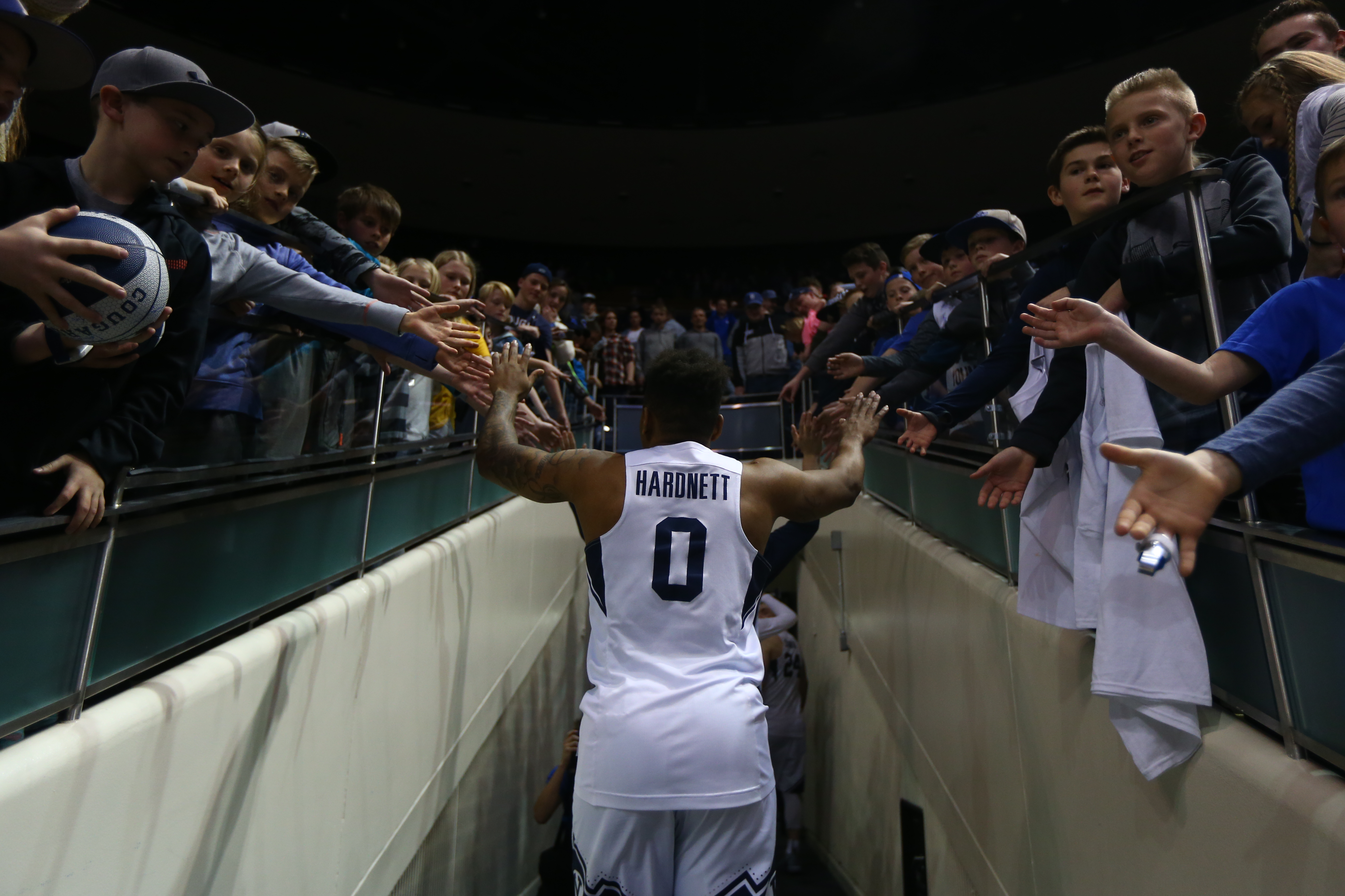 BYU guard Jahshire Hardnett (0) high fives fans after defeating the Loyola Marymount Lions 67-49 at the Marriott Center in Provo on Saturday, Feb. 2, 2019. (Photo: Silas Walker, KSL)