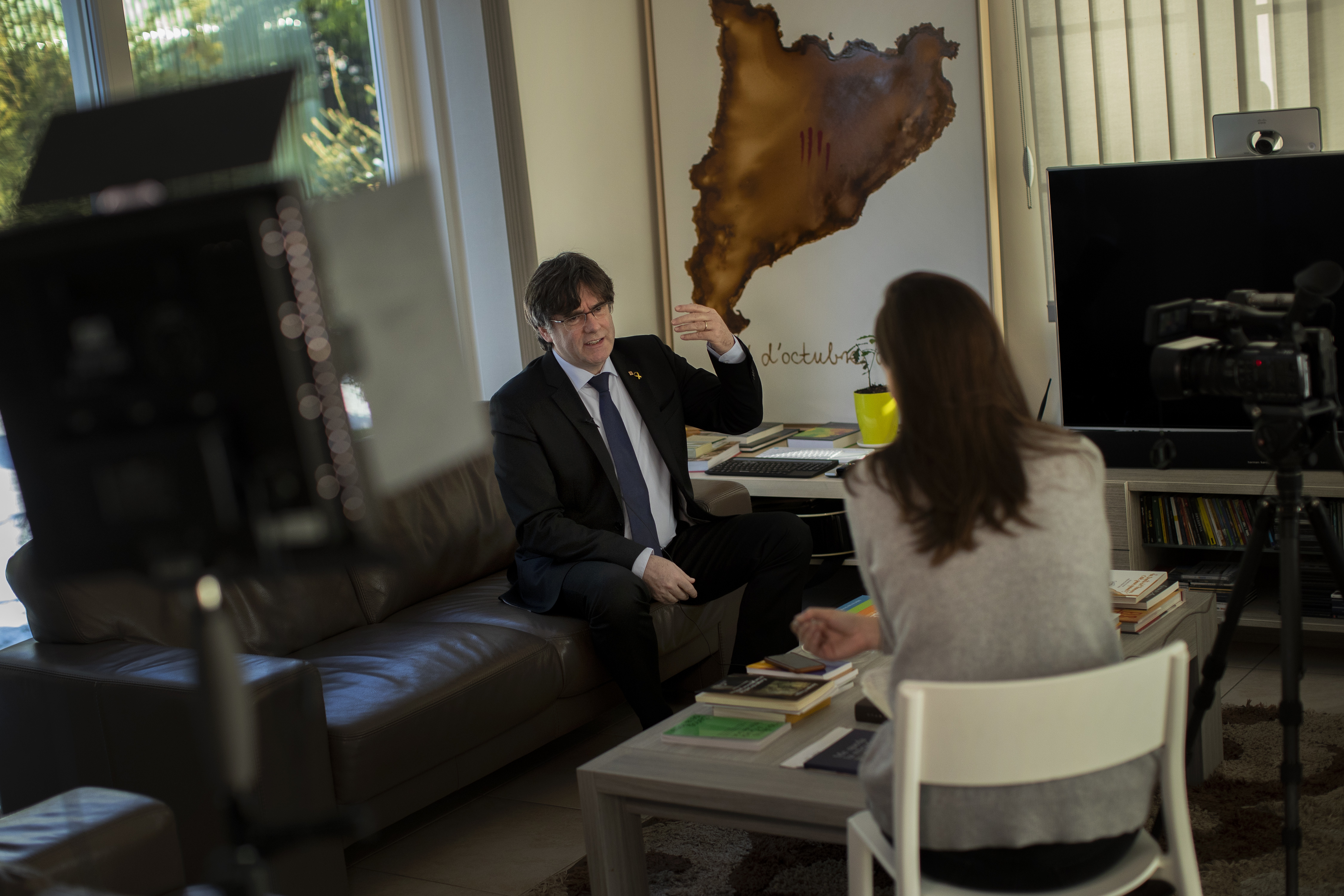 AP Interview: Puigdemont says Catalan trial 'vengeance'