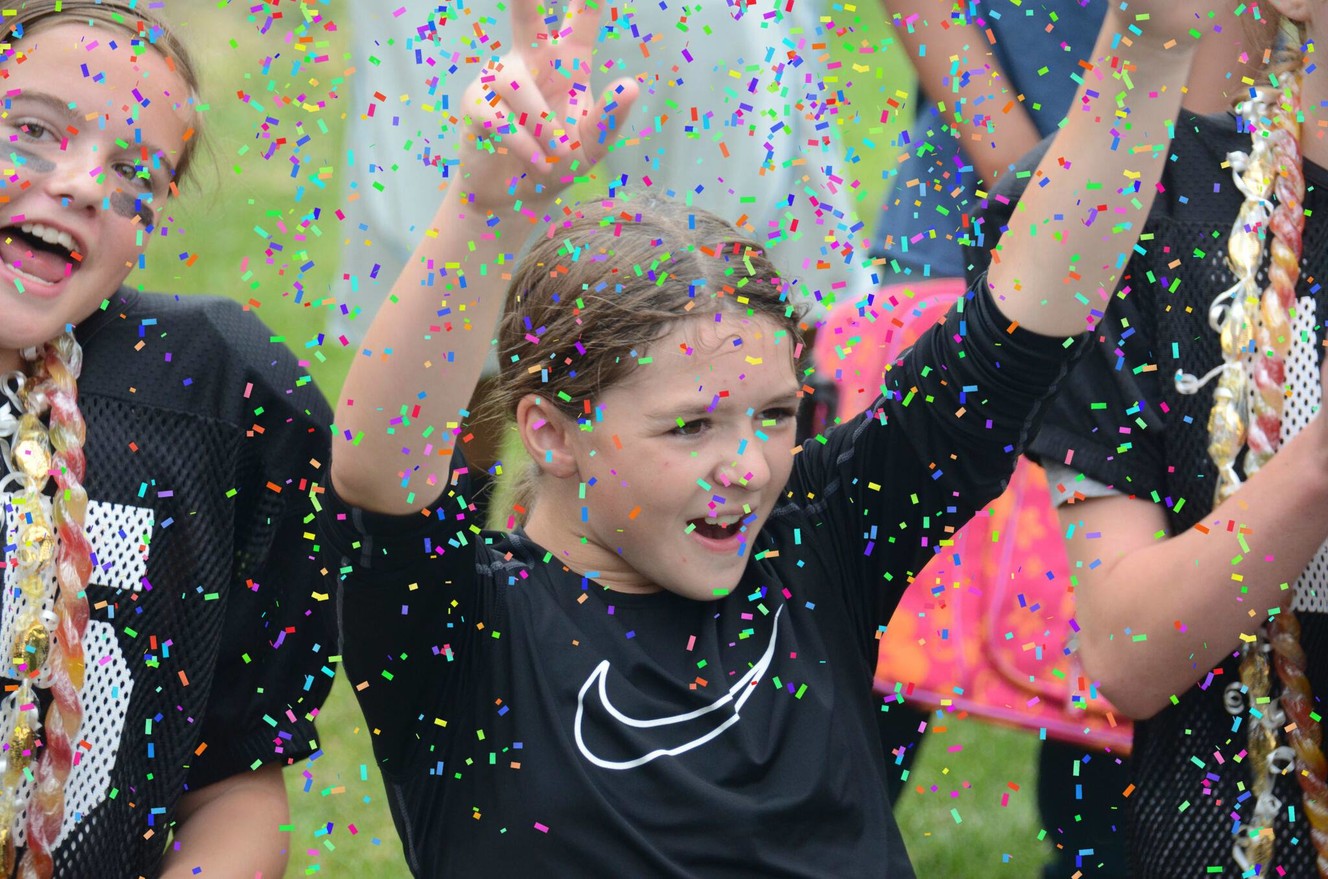 Young Sam Gordon celebrates a victory. (Photo: Utah Girl's Tackle Football League)
