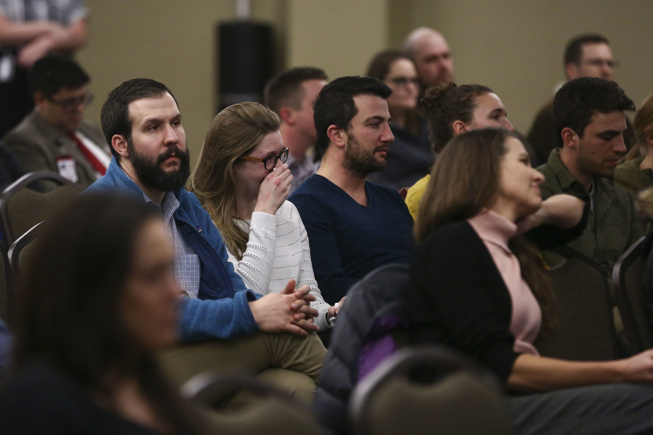 Lesley Plunkett wipes tears from her eyes with her husband Winston Plunkett at a candlelight vigil in memory of Dr. Sarah Hawley at the University of Utah Guest House in Salt Lake City on Monday, Feb. 4, 2019. Hawley was killed by her boyfriend in what police believe to be a murder-suicide on Jan. 27, 2019. (Photo: Silas Walker, KSL)