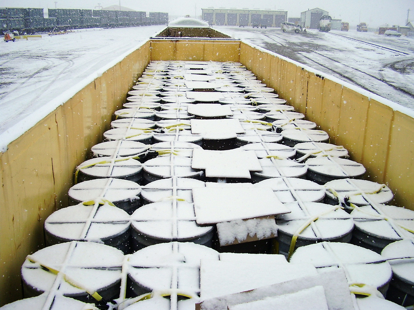 Drums of depleted uranium inside gondola railcars are pictured at EnergrySolutions' Clive disposal site in Tooele County. Photo: Ryan Johnson, Utah Division of Radiation Control