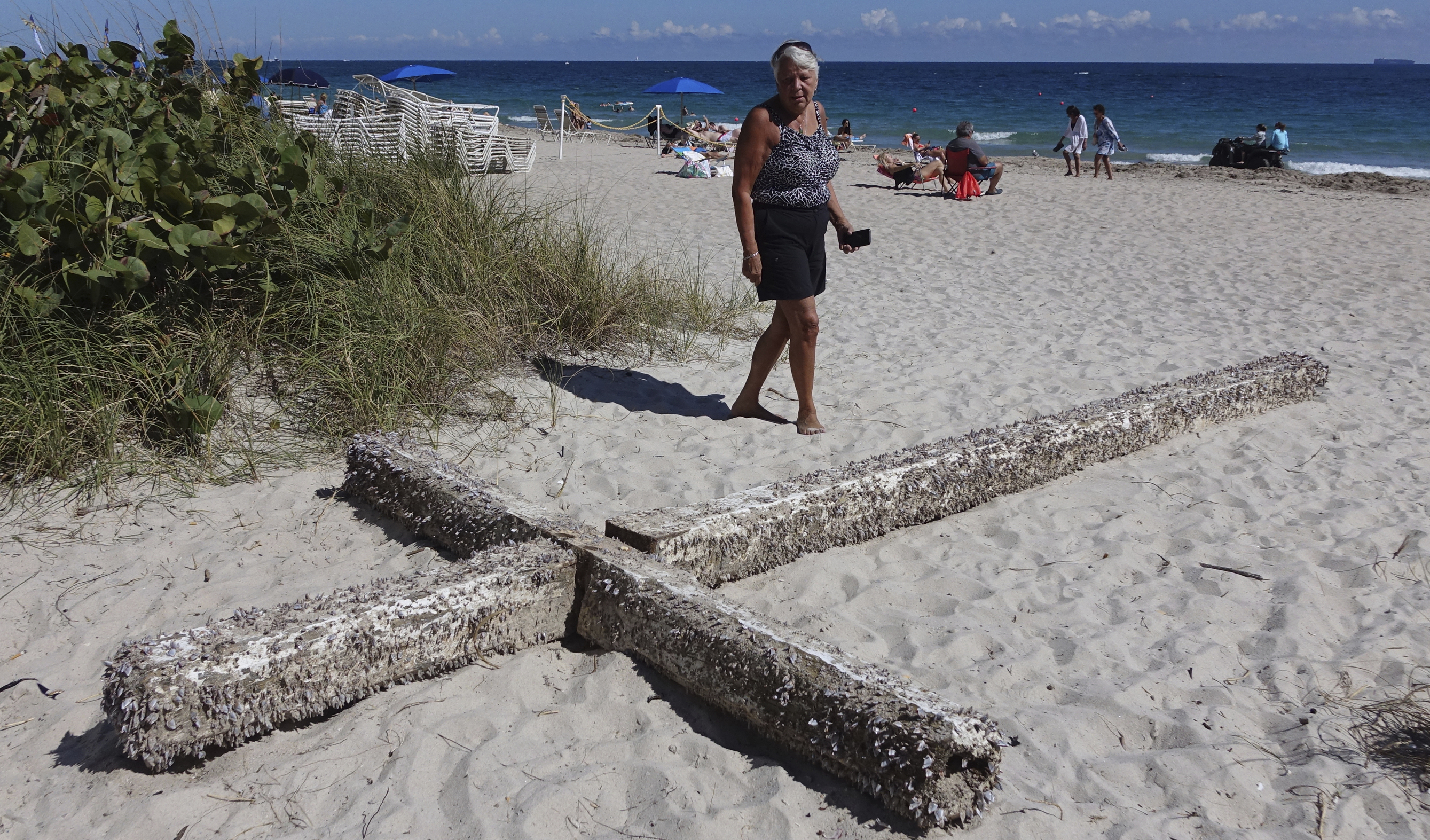 Barnacle-covered wooden cross washes up on Florida beach