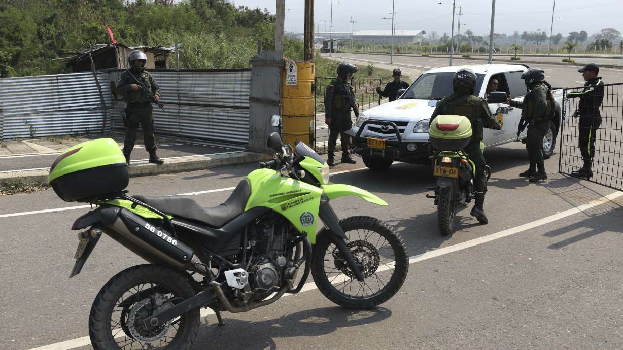Venezuela military barricades bridge in attempt to block aid