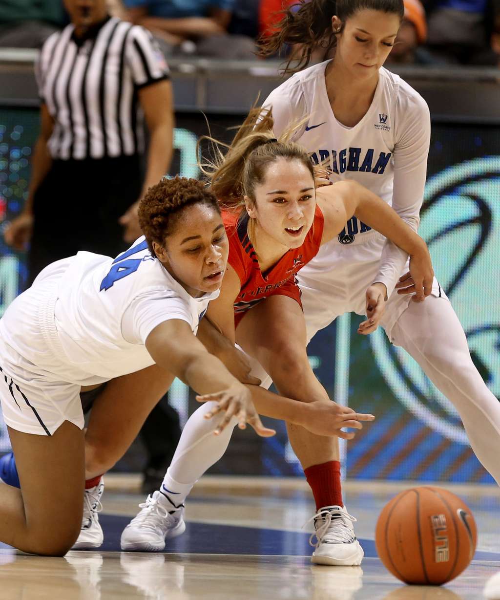 BYU Cougars forward Babalu Ugwu (14), Saint Mary's Gaels guard Jasmine Forcadilla (3) and BYU Cougars guard Brenna Chase (1) compete for the ball at the Marriott Center in Provo on Thursday, Feb. 7, 2019. (Photo: Laura Seitz, KSL)