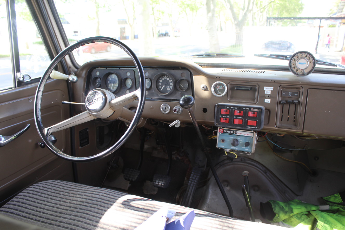 Largely untouched cab of Michael Goodfellow's 1965 GMC Rescue; he said he cleaned up the wiring and brackets from removed equipment. (Photo: Brian Champagne)