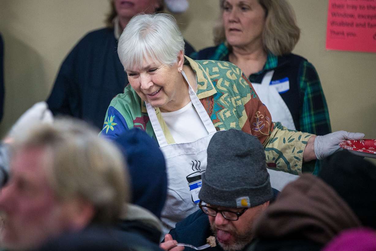 Utah Jazz owner Gail Miller serves up salad during the annual Christmas dinner to more than 800 homeless Utahns at St. Vincent de Paul Dining Hall in Salt Lake City on Tuesday, Dec. 25, 2018. (Qiling Wang, KSL)